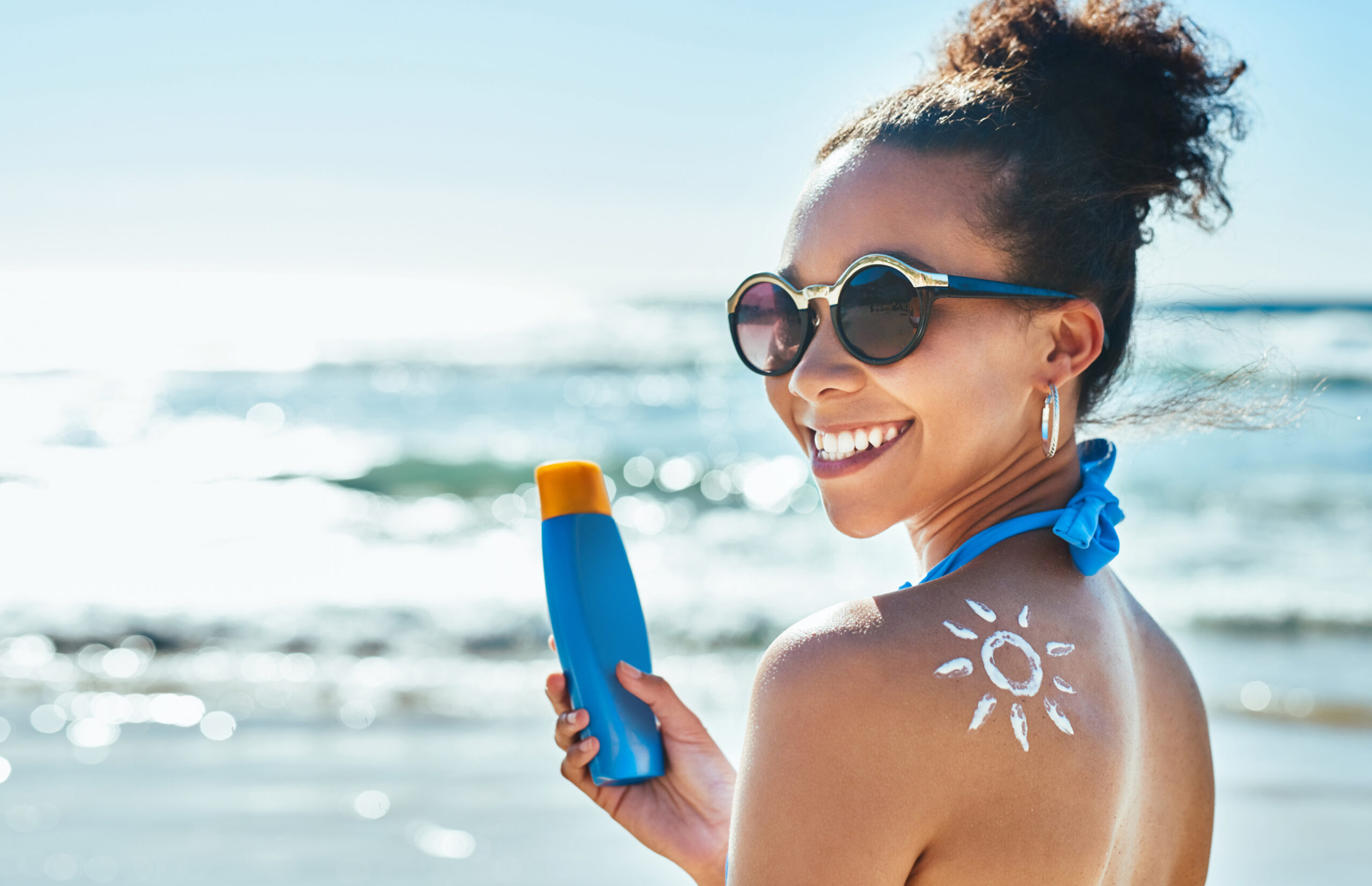 woman-sun-screen-shoulder-beach-skincare-protection-outdoor-travel-ocean-female-person-summer-bottle-spf-lotion-cosmetics-by-waves-nature-shades-holiday-bali
